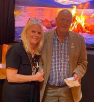 Handing over the President's chain.