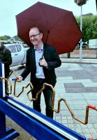 Andrew Cooper MP tries his hand at the Rotary Buzzzz Game, at a fundraiser in 2025