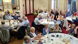 Joining in the fun to Neil Diamond’s ‘Sweet Caroline’