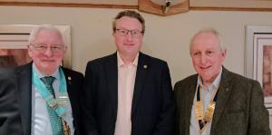 New Member Tom Groves, (Centre) with DG Edwin Partridge (Left ) and President, John Savage (Right)