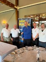 Their captain, James Sheridan, also won the individual prize. He is pictured with the rest of his team shaking hands with Wolsey President David Wilson.