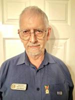 Joint President John A Williams wearing his Rotary Poppy Badge