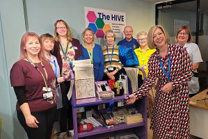 Donation to Dorset County Hospital - new Activities Trolley