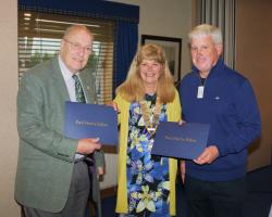 President Anna presents Paul Harris Fellowship awards to Ian and Ewan