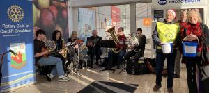 Glasllwch Brass Band playing and collection at Sainsbury's Colchester Avenue