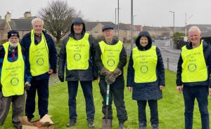 End Polio Now crocus planting...in the rain....