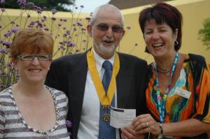 Our picture shows Senior Vice President Martin Keable, presenting a cheque for £422, to Maxine Taylor, who is the Centre’s chief fundraiser on the right and Roberta Lovick who is the mother of Louise Hamilton after which the Centre is named
