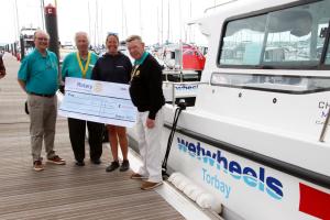 Check presentation from Preston Rotary Club (Torbay) to Wet wheel Charity