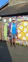 John still upright and smiling at the end of his 25 mile trek!