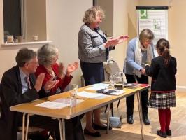 Prize Winner receiving her prize