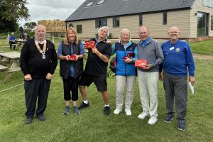 Winners of the 2026 Golf Charity Day with President Robert and Rotarian Phil
