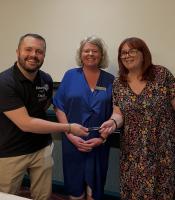 Business - Lindsay Smith & artist Scott, Kilsyth Academy Library Mural