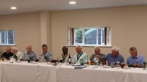 From the left Bill Pierce, Keith Blackburn, Mike Allen, David Pattenden, President Collins Griffith, Hailsham Vice President David Ashdown, Hailsham Club Secretary Rosemary Mullen, Hailsham member Keith Mullen and Jim Anderson
