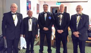 District Governor Mike Kew with this year's four Presidents
