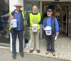 Collecting for the Nepal disaster.