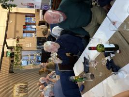 A rather blurry picture of Adrian and Richard with other club members in the background. 