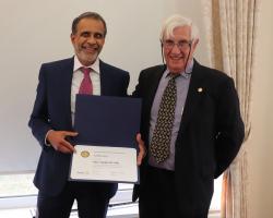 Arif Essaji with his Paul Harris Fellowship Award presented by President Clive Livingstone.