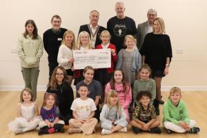 Members of Rhapsody Artist Development with from rear row 2nd from the left Tony Humphreys, Martello Rotary Club, President Mike Barker, Founder Kev Thompsett, Paul Vaesen, Chair Youth Services committee and vocal coach Catherine Jordan