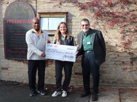 Vice President Collins Griffith and Tony Humphreys from Seaford Martello Rotary Club presenting the grant cheque to Jeanette Thompson from the charity Just Friends