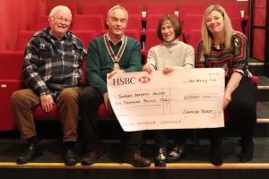 From the left:  Members of Seaford Dramatic Society: Lettings Officer Phil Armstrong, Chair Sue Williams and Treasurer Tanya Baxter with Seaford Rotary President Mike Barker (2nd left)