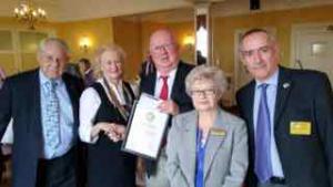 Paul Webber from Norfolk Lowland Search & Rescue being presented the award from Club President Diana Loveland. Included are: District Governor Elect Robert Lovick, Community and Vocational Chairman Rotarians Gillian Brown and Gordon Craig