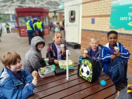 Kids enjoy a day out - despite the rain!