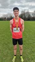 Isaac Battye with Greater Manchester XC Gold Medal