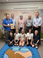 Witney Rotary and pupils at Witney Community Primary School celebrating the launch of the 2026/27 Rotary Junior Community Award.