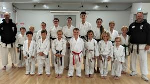 Seaford Karate Club junior members with instructors Steve ‘The Jedi’ Jakes 2nd Dan on the left and Dan Sensei Martin Dean, 5th Dan on the right