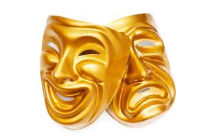 Two golden Greek actors' masks