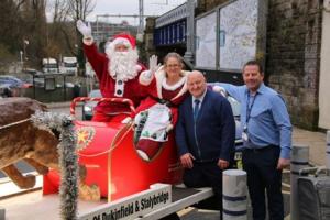 Dukinfield and Stalybridge Rotary called upon Santa Claus to meet and greet schoolchildren