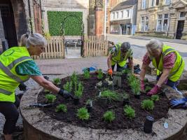 Cockermouth Rotarians planting the Herb Bed