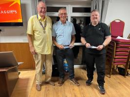 New members Wilf Krumfort & Steve Jones pose with President Richard Massey following their induction into the club
