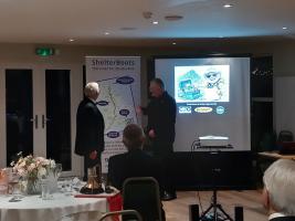 Dave Foster describes his marathon walk to Rotary members