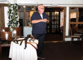 Rotarian Jess Mitchell presented his antique gun collection