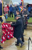 Rotarian Tony Wood MBE laying the wreath at the War memorial 