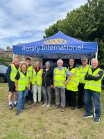 Picture of several club members under the District gazebo in Kings Park