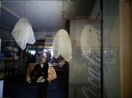 ghosts in the chemist window