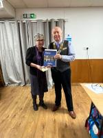 Joan and Anton pose following her induction into the Club