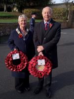 Anton Rudglavis and Jan Hinde prepare to lay wreaths at the Rushden War Memorial