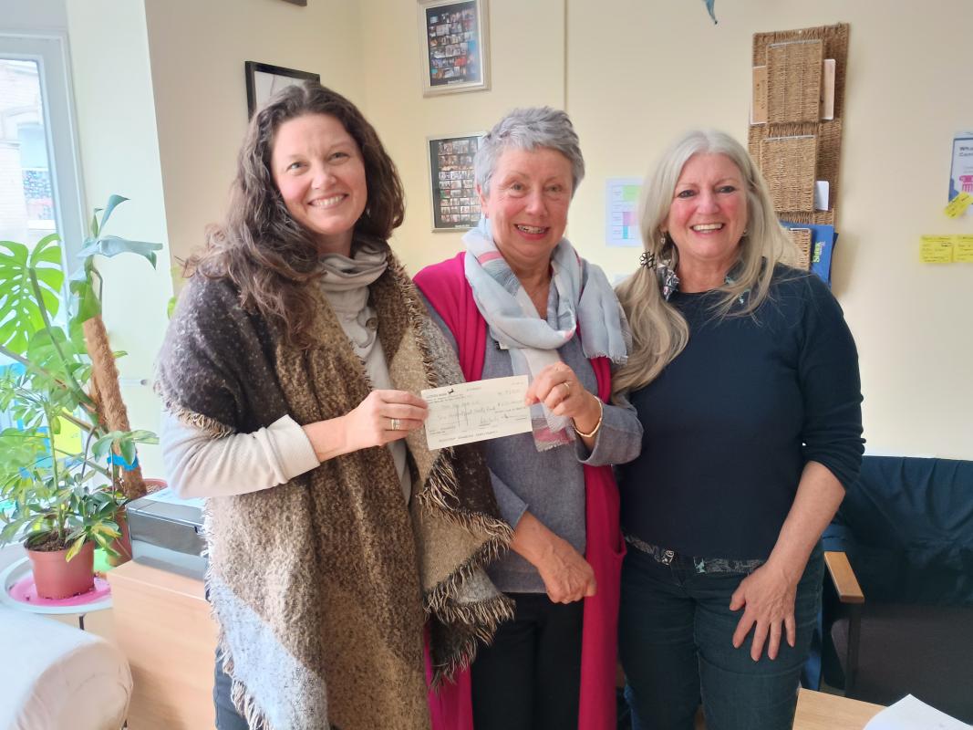 Vanessa handing over another Cheque