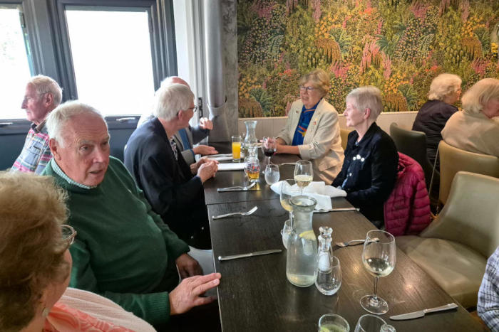 People sitting round a restaurant table